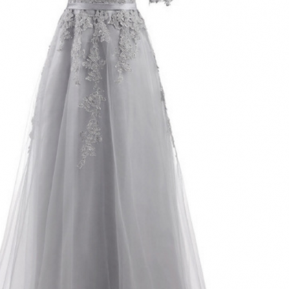 A Grey Formal Gown With A Long, Half-sleeved Dress..
