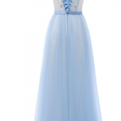 The V-neck Ball Gown In The Foyer Is An Elegant..