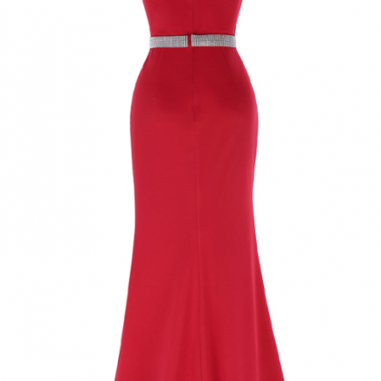 A Red Beaded Evening Gown With A Sexy Sleeveless..