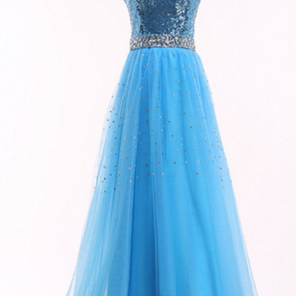 A Bright Blue Ball Gown With A Golden Tulle Gown..