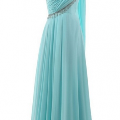 A Long, Green, Elegant Beaded Evening Gown With A..