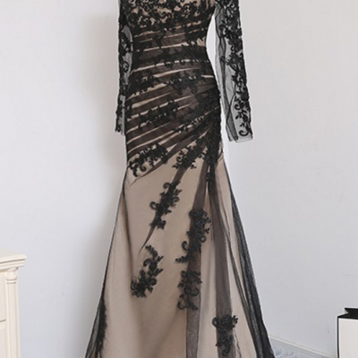 A black, elegant evening gown with a mermaid tulle satin gown with a long evening gown