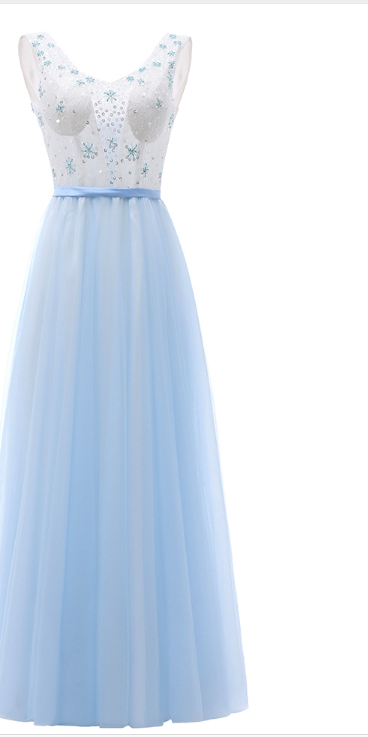 The V-neck Ball Gown In The Foyer Is An Elegant Long Evening Gown