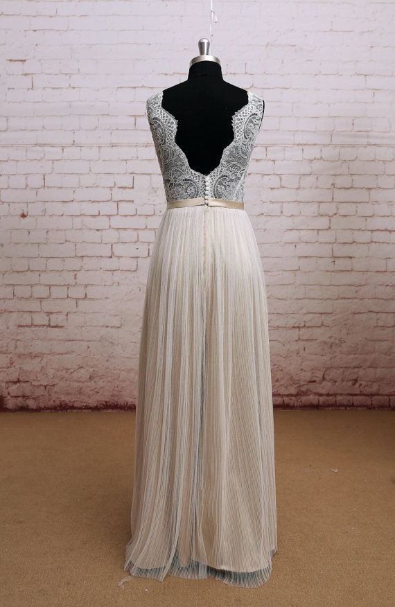 Champagne A-line Floor-length Wedding Dress With Sheer Pleated Overlay And Lace Bodice Champagne A-line Floor-length Wedding Dress With Sheer Pleated Overlay And Lace Bodice