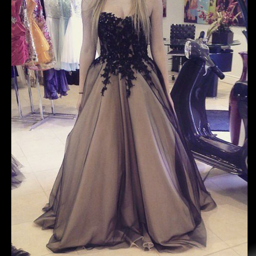 black and champagne prom dress