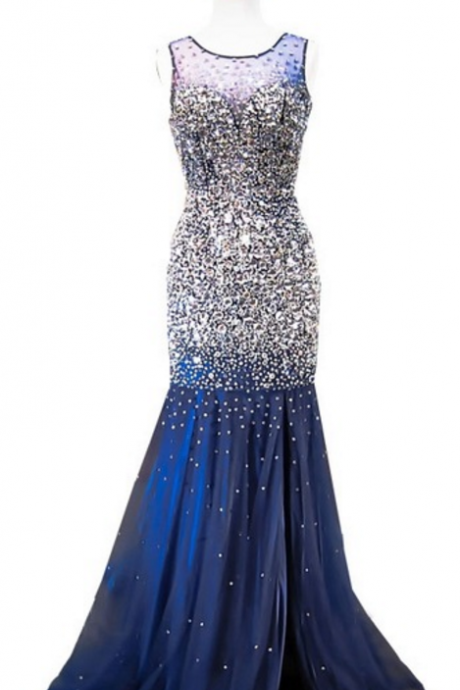 The deluxe mermaid scallop has a sleeveless crystal sparkling navy blue dress