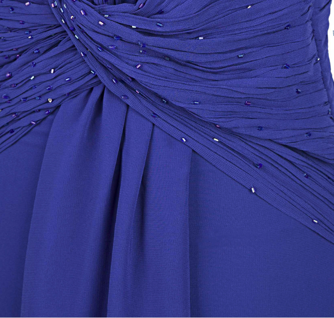 A Sleeveless Ruffled Chiffon Chiffon Gown With A Long Evening Gown on Luulla
