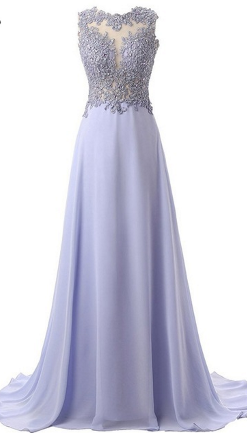 A Long, Elegant Evening Gown Full Of O - Shaped Lace And Formal Evening ...